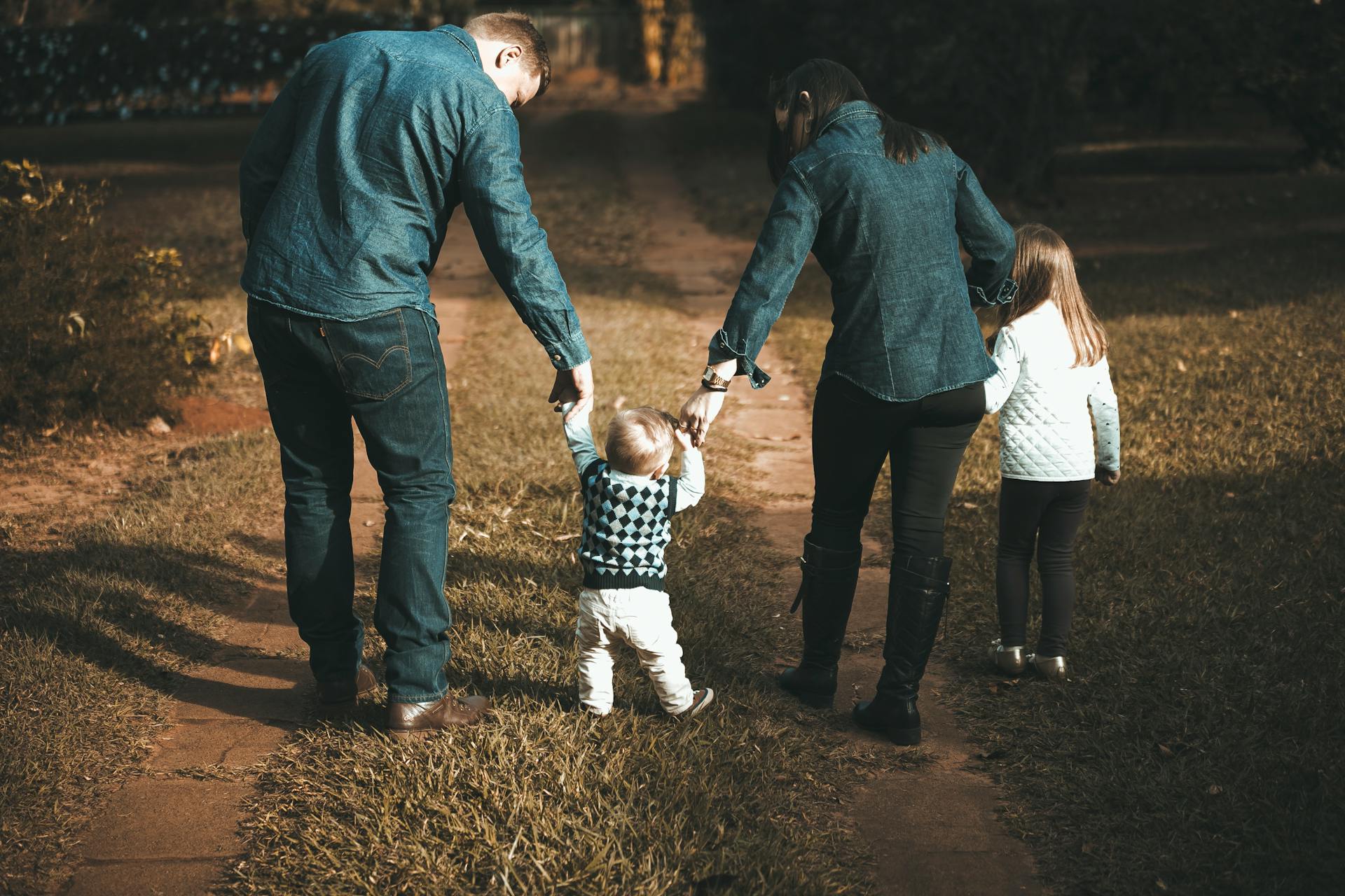 Happy family in front of their pest-free Riverside CA home